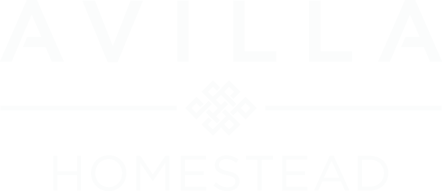 The image shows a logo with the words "AVILLA HOMESTEAD" written in white on a green background.
